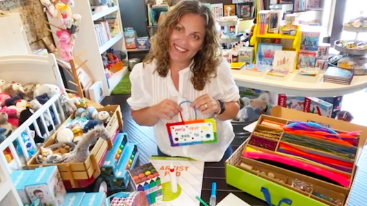 First Day of School Sign DIY with Play Toys and Books